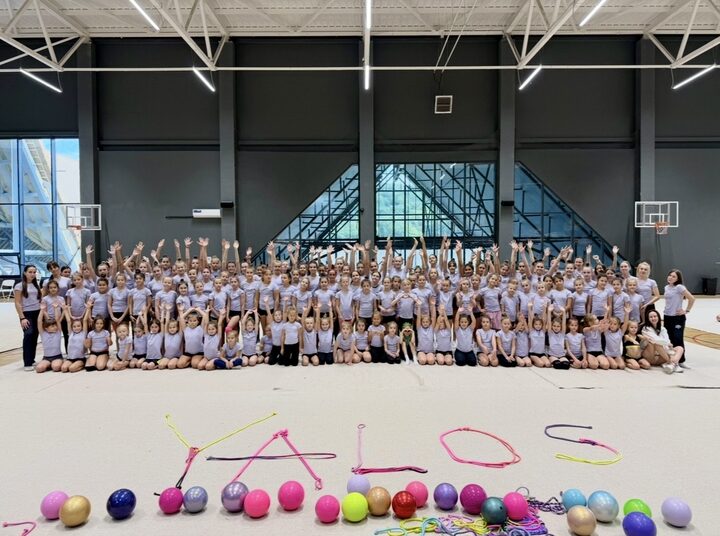A large group of YALOS gymnasts training in the gym
